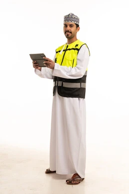 Omani Engineer with Tablet in Safety Vest