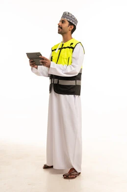 Omani Engineer with Tablet in Safety Vest