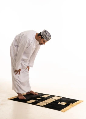 Omani Man Performing Ruku Prayer in Studio