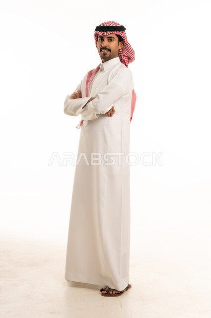 Smiling Saudi Man in Traditional White Thobe Studio