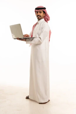 Saudi Man with Laptop on White Background