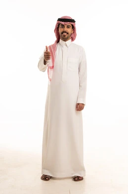 Saudi Man in Traditional Thobe Giving Thumbs Up