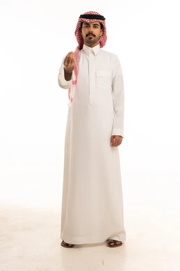 Saudi Man in Traditional Thobe Making Hand Gesture