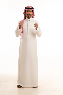 Saudi Man in White Thobe Success Gesture Studio