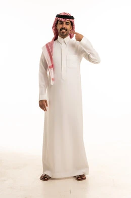 Saudi Man Pointing at Smile in Traditional Thobe