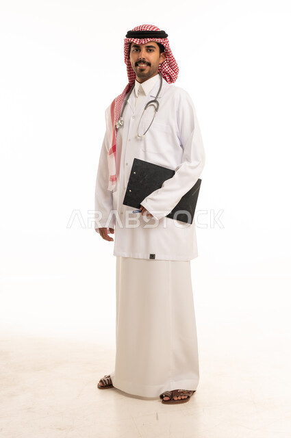 Saudi Male Doctor in Traditional Attire Holding Clipboard