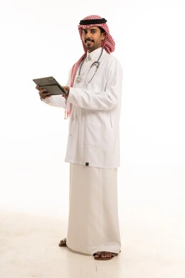 Saudi Male Doctor with Tablet in White Lab Coat