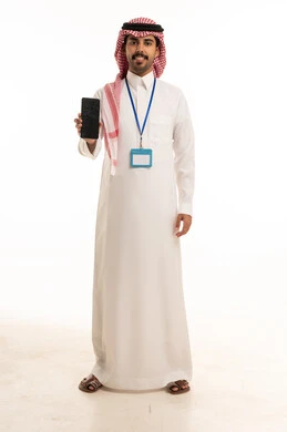 Saudi Man Holding Smartphone in Traditional Attire