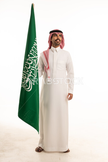 Saudi Man Holding National Flag on White Background