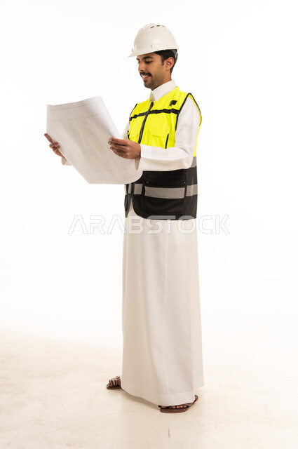 Saudi Engineer Holding Blueprints in White Studio