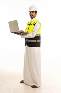 Saudi Engineer in Safety Vest Holding Laptop