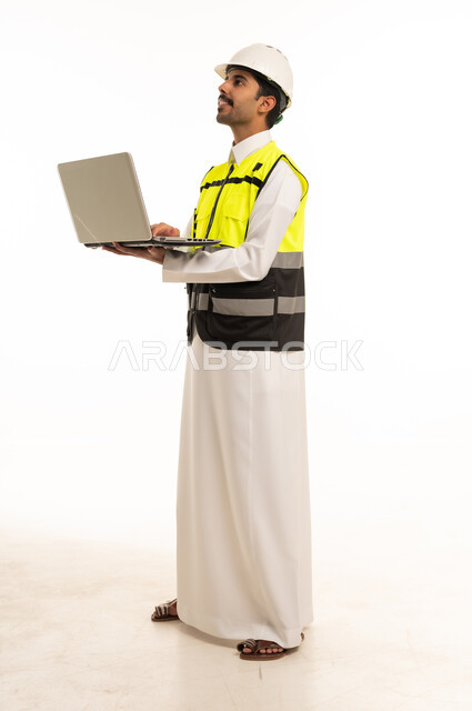 Saudi Engineer with Laptop wearing Safety Vest