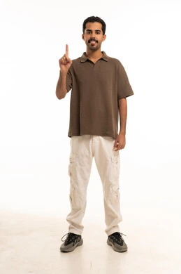 Saudi Man Pointing Index Finger Up on White Background