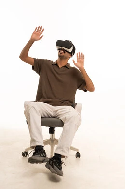 Saudi Man Using Virtual Reality Headset on White Background