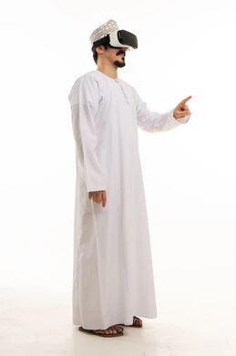Omani Man Using VR Headset on White Background