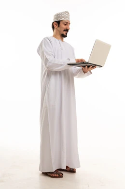 Omani Man Using Laptop on White Background