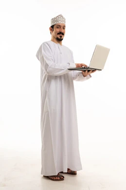 Omani Man Using Laptop Computer on White Studio Background