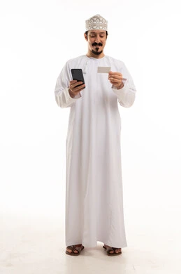 Omani Man Using Smartphone and Credit Card in Studio