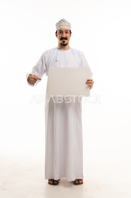 Omani Man Holding Blank White Board on White Background