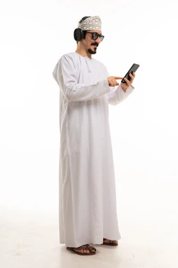 Omani Man in Traditional Dress Using Smartphone