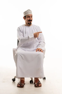 Omani Man Pointing in Traditional Dress on White Background
