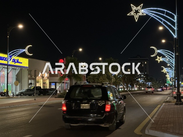 First Street Dammam Night Traffic with Star Decorations