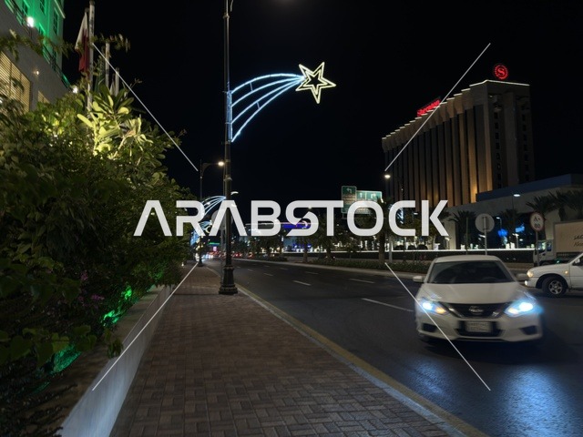 Dammam First Street Cityscape and Traffic at Night