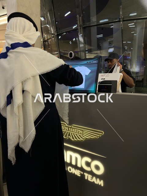 Saudi Man at Ithra Dhahran Using Digital Kiosk
