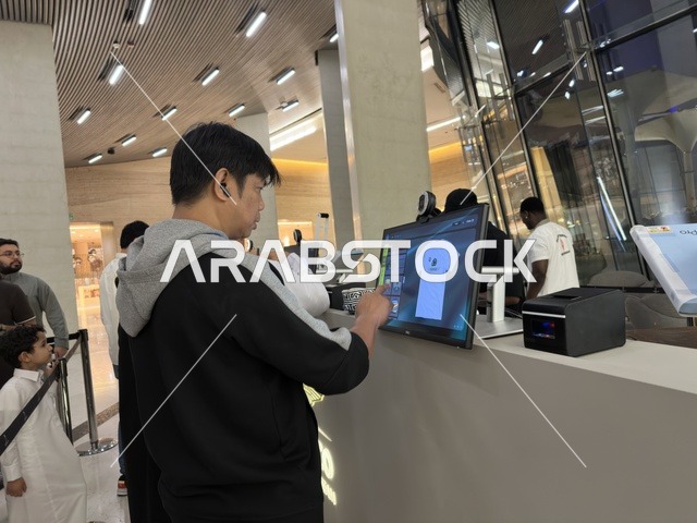 Man Using Digital Screen at Ithra Dhahran