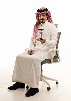 Saudi Businessman Holding Hourglass on White Background
