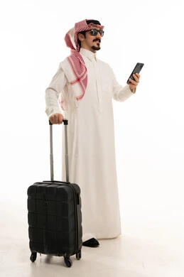 Saudi Man with Suitcase and Smartphone on White Background