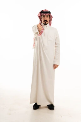 Saudi Man Giving Thumbs Down Gesture on White Background