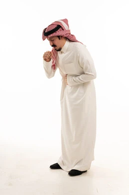 Sick Saudi Man Coughing on White Background