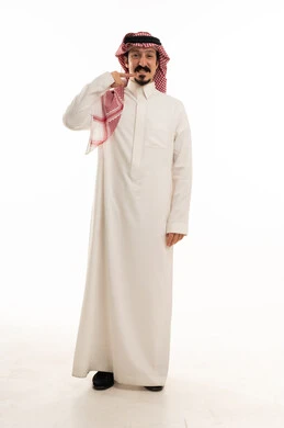 Saudi Man in Traditional Thobe Pointing at Mouth