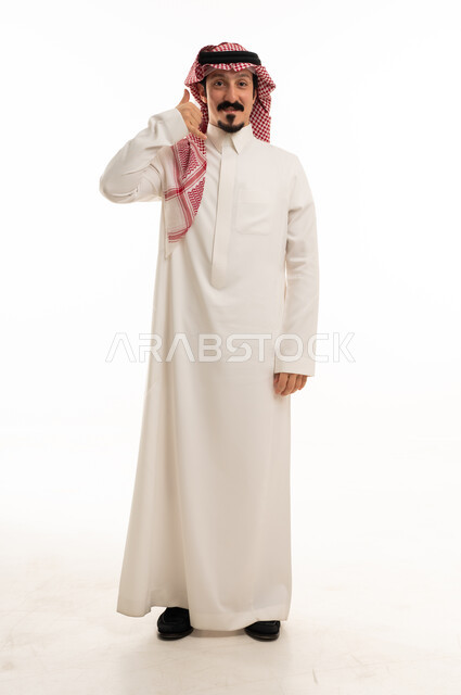Saudi Man Making Call Me Gesture White Background