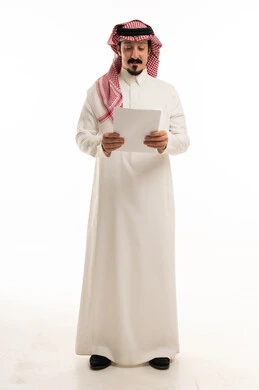 Saudi Man in Traditional Thobe Reading Document