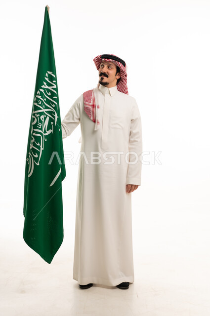 Saudi Man Holding Saudi Arabia Flag on White Background