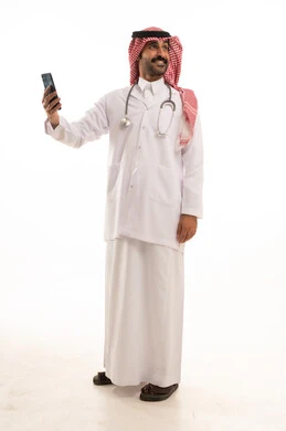Saudi Male Doctor in Traditional Thobe with Smartphone