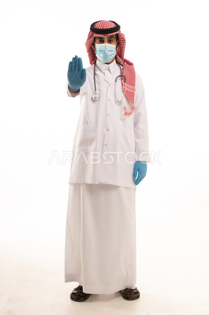 Saudi Male Doctor in Traditional Thobe Making Stop Gesture
