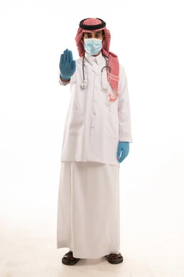 Saudi Male Doctor in Traditional Thobe Making Stop Gesture