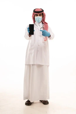 Saudi Male Doctor in Traditional Dress with Smartphone