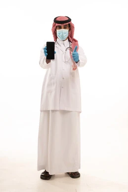 Saudi Doctor with Smartphone and Thumbs Up Gesture