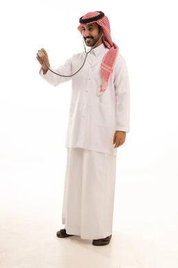 Saudi Male Doctor in Traditional Thobe with Stethoscope