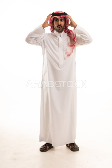 Shocked Saudi Man in Traditional Thobe Studio Portrait