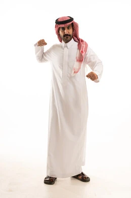 Training in combat movements, increasing muscle endurance, a portrait of an Arab Gulf Saudi man wearing a white thobe and shemagh learning the arts of boxing, maintaining physical fitness, enhancing bone and joint health, full-body image, white background.