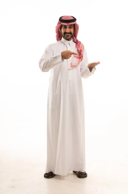 Pointing to something, standing upright and straight, a portrait of a Saudi Gulf Arab man wearing traditional attire and a ghutrah, pointing with his hands to a specific place, a full-body image, white background.