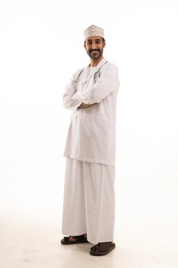 A portrait of an Arab Gulf Omani doctor wearing a dishdasha, turban, medical coat, and mask, holding a stethoscope, working in the healthcare sector, full-body, white background.