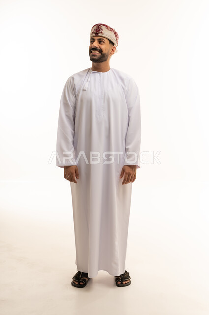 Smiling Omani Man in Traditional Dress White Background