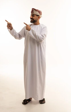 Omani Man in Traditional Dress Pointing Aside