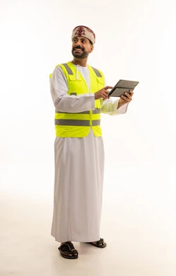 Omani Engineer with Safety Vest and Tablet